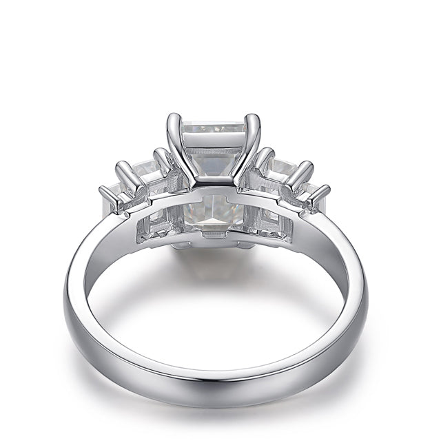 Rhapsody Emerald Cut Three Stone Moissanite Diamond Engagement Ring